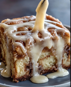 Famous Big Mama’s Secret Cinnamon Roll Poke Cake.