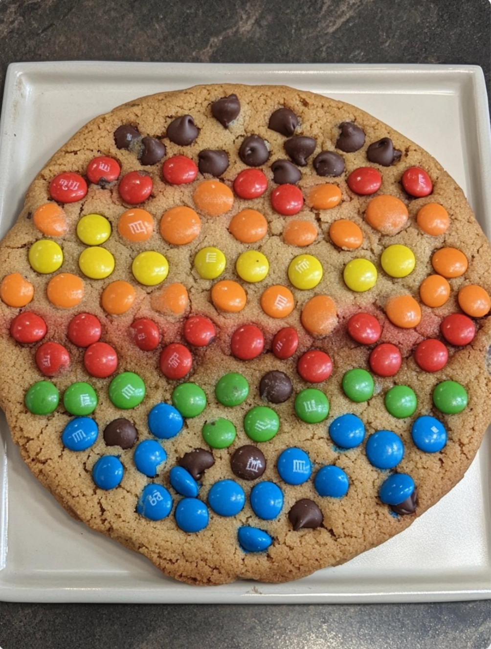 Giant chocolate chip rainbow M&M cookie