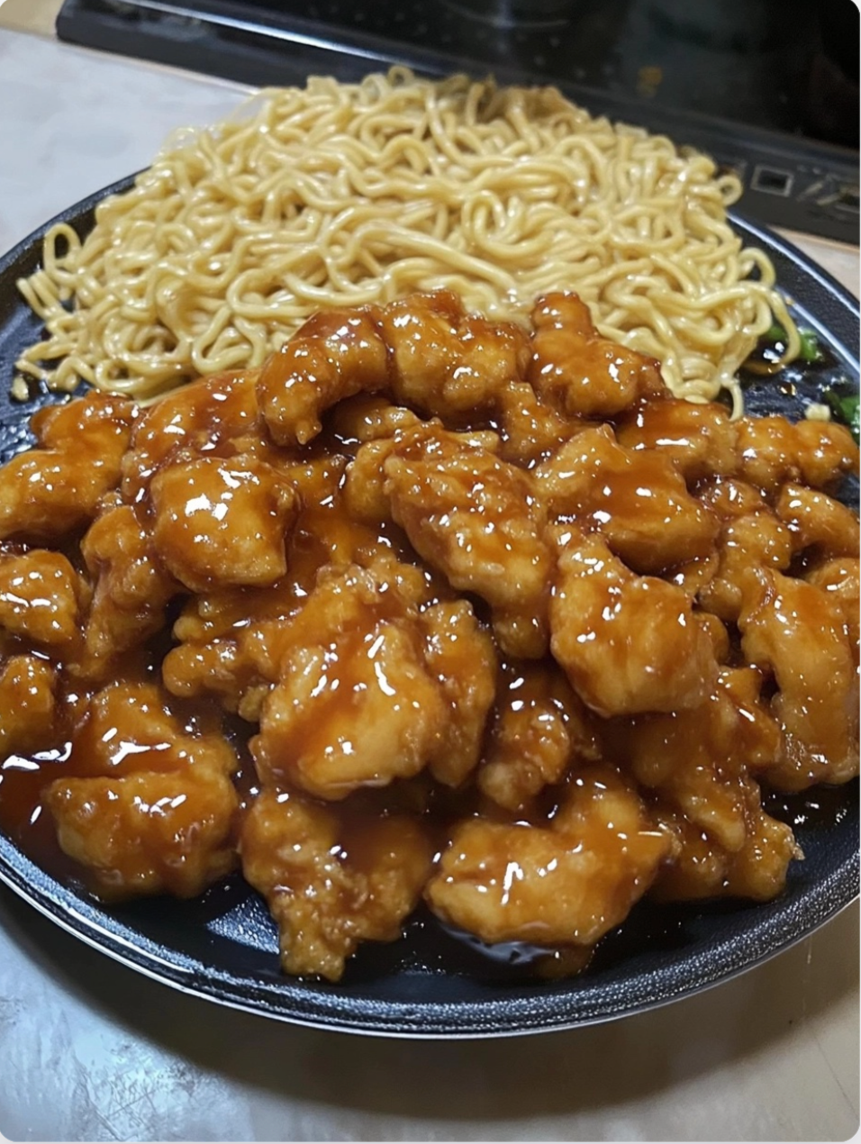 Orange-Glazed Chicken over Garlic Ramen