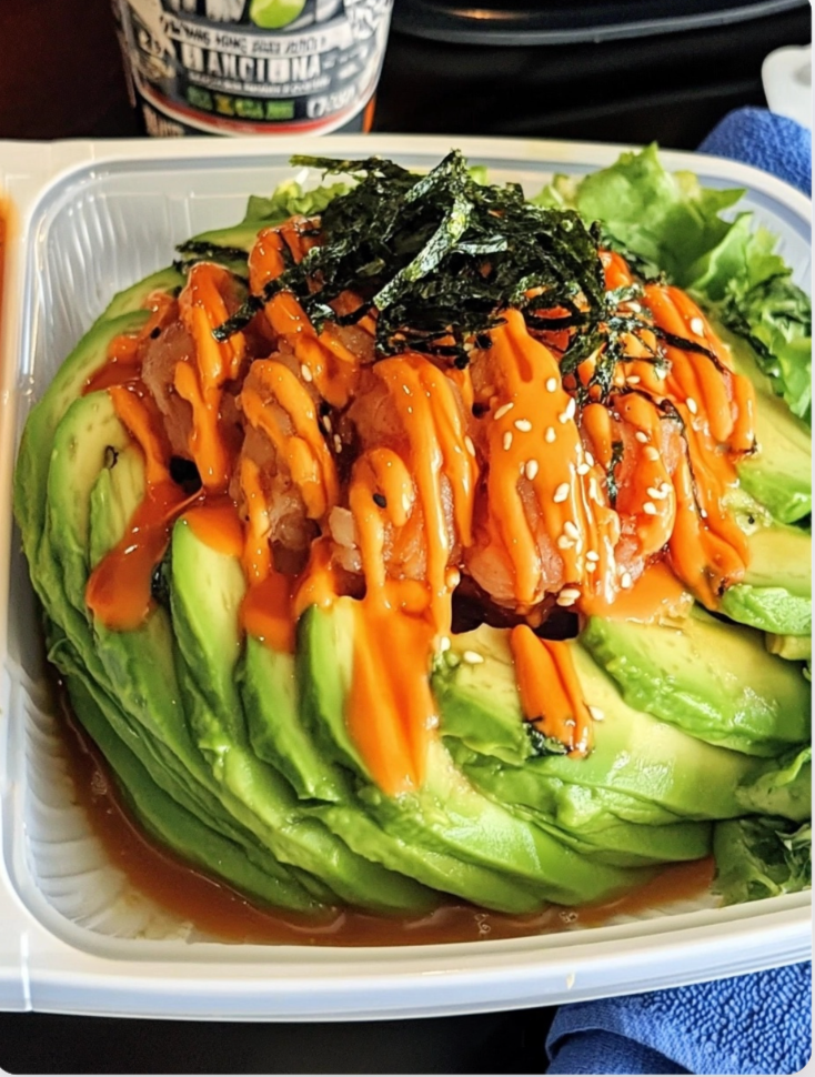 Avocado Bomb: Spicy Tuna and Crab with Seaweed Salad and Roe