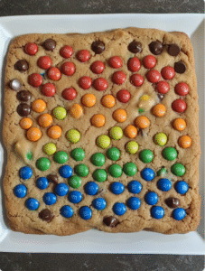 Giant chocolate chip rainbow M&M cookie