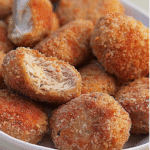 Macaroni with beef, peppers, onions in cheesy tomato sauce