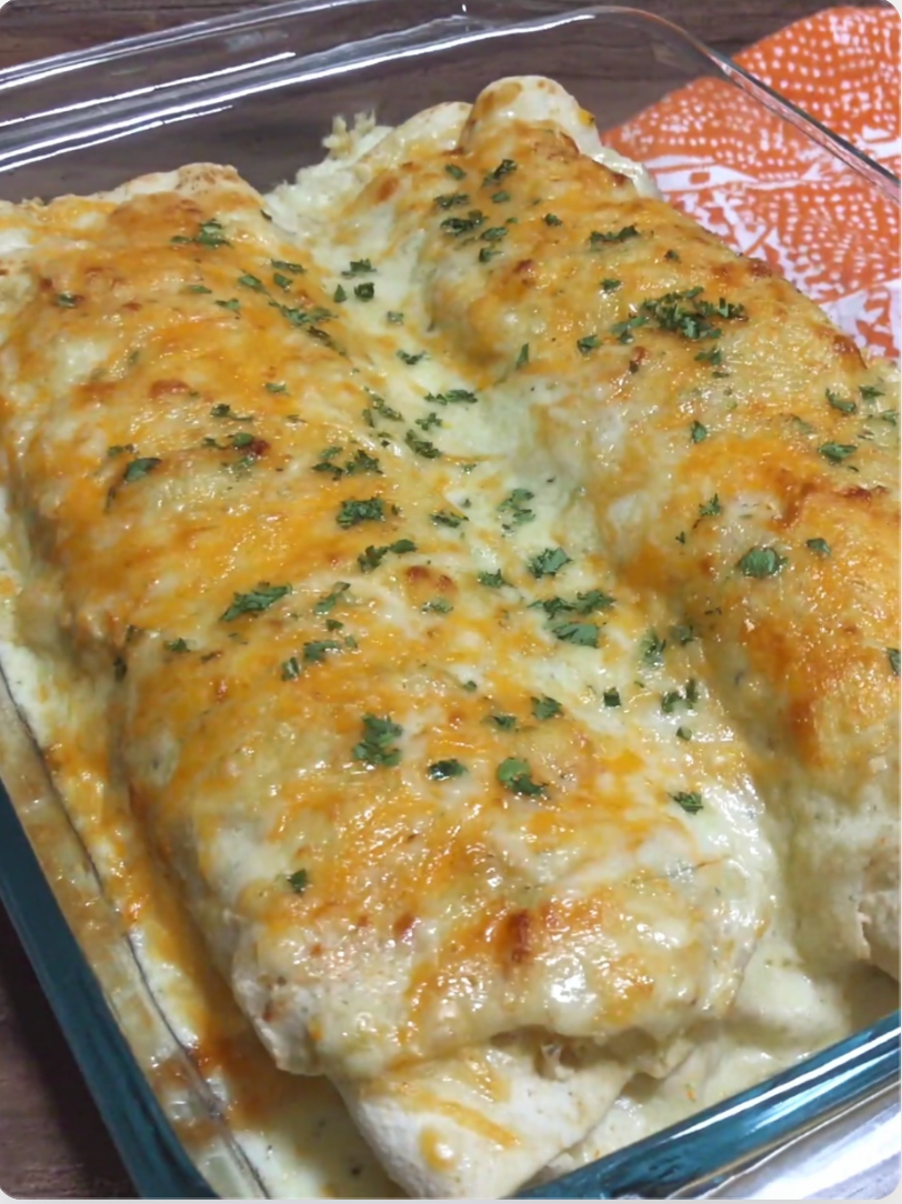 Cheesy Chicken Enchiladas with Creamy Sauce