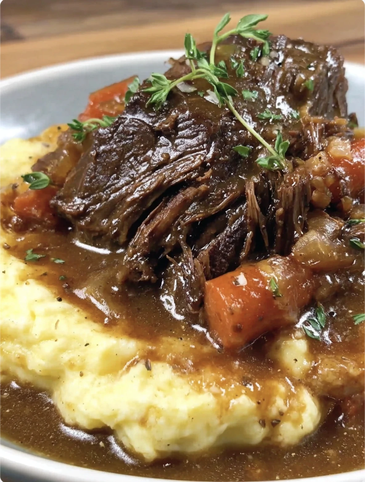 Classic Pot Roast Over Creamy Mashed Potatoes