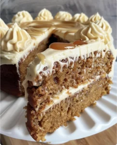 Carrot cake with cream cheese frosting and caramel